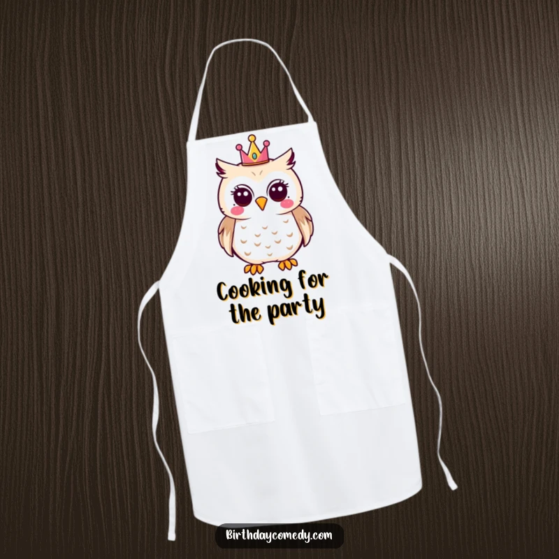 Funny owl apron with a joyful owl wearing a tiny party crown, making it a humorous and practical kitchen accessory.
