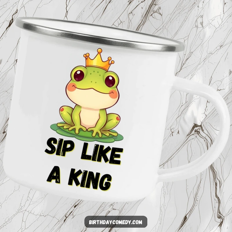 Funny Camping Mug with a crowned frog balancing a lily pad hat, designed for outdoor fun and laughter.