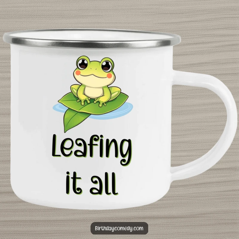 Funny frog camping mug showing a content frog with bulging eyes floating on a leaf, perfect for outdoor relaxation.