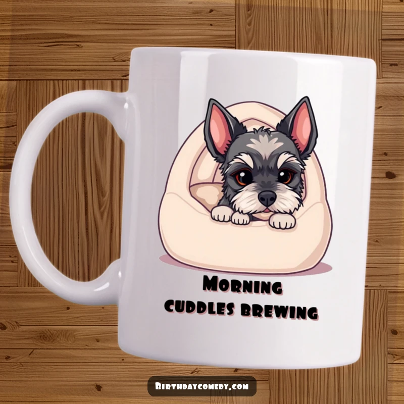 Funny mug featuring a cute schnauzer puppy peeking out from a cozy dog bed with big, innocent eyes, radiating adorable mischief.
