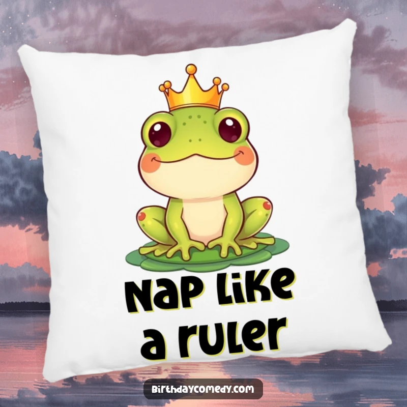 Funny Pillow with a happy frog sporting a crown, balancing a lily pad hat, offering comfort and comic relief.