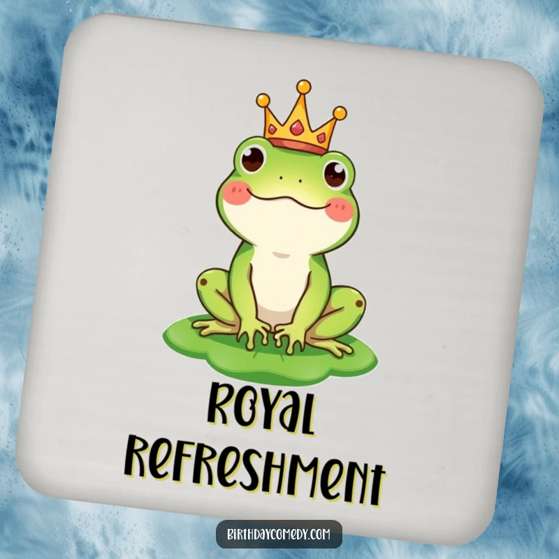 Funny drink coaster featuring a happy frog wearing a tiny crown and balancing a lily pad as a hat, perfect for regal protection.