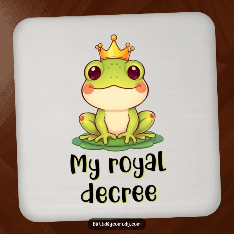 Funny Drink Coaster showcasing a happy frog wearing a crown and balancing a lily pad hat, adding quirky decor.
