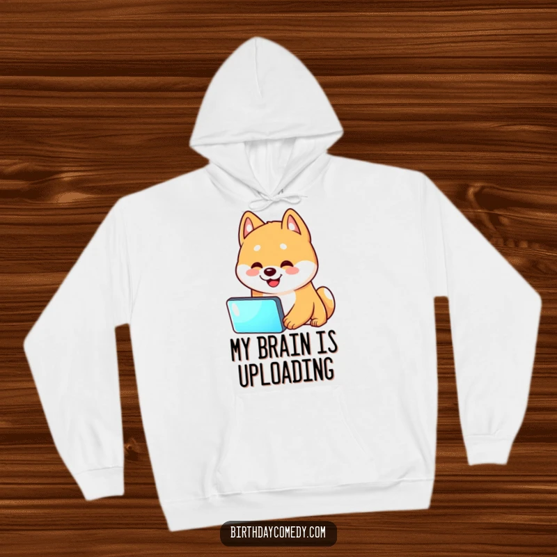 Funny Shiba Inu hoodie featuring a Shiba Inu in a head tilt, staring intently at a bright screen, perfect for techies.