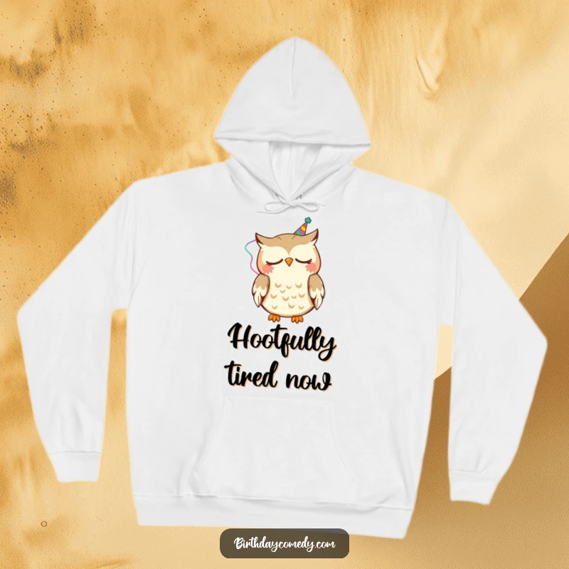 Funny Hoodie featuring a sleepy owl wearing a party streamer, happily nodding, offering cozy and comical warmth.