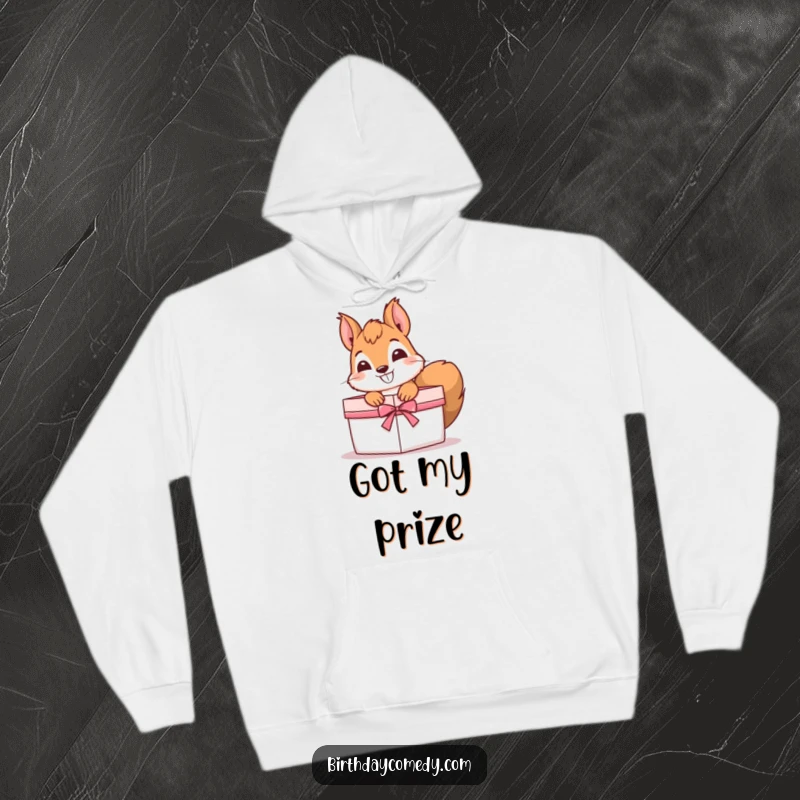 Funny Hoodie featuring a curious squirrel with a grin, peeking out from a gift box, offering cozy and comical warmth.