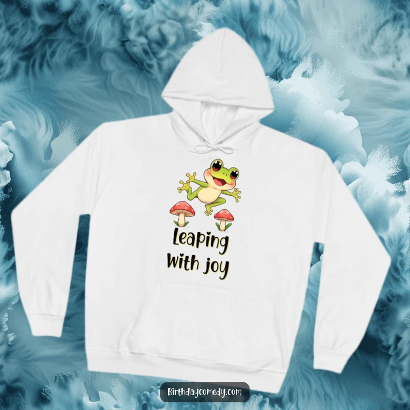 Funny hoodie featuring a joyful frog with wide, curious eyes leaping between mushroom caps, perfect for cozying up after adventures.