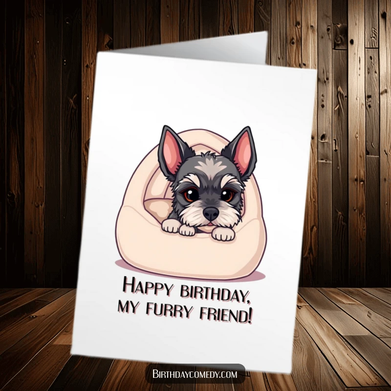 Cute Free Printable birthday card, schnauzer puppy peeking from cozy dog bed, adorable and heartwarming, downloadable.