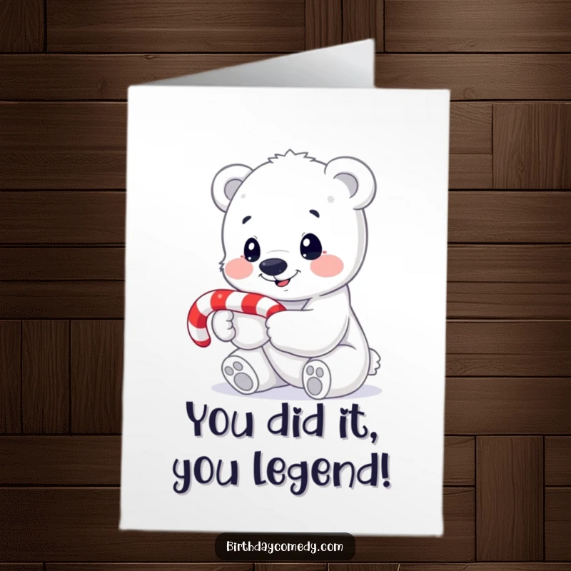Funny free printable congratulations card showing a smiling polar bear cub with a candy cane, looking curious.