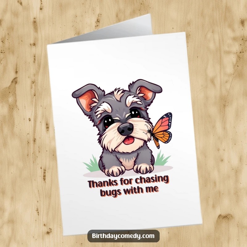 Funny Free Printable Thank You Card: Playful schnauzer, head tilted, watching a butterfly, sending thanks with a humorous, downloadable design.