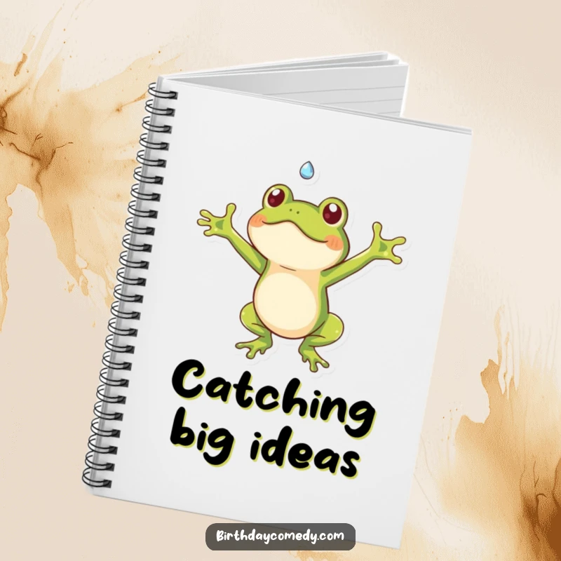 Funny frog notebook with a playful frog catching a falling dewdrop, ideal for jotting down notes with humor.