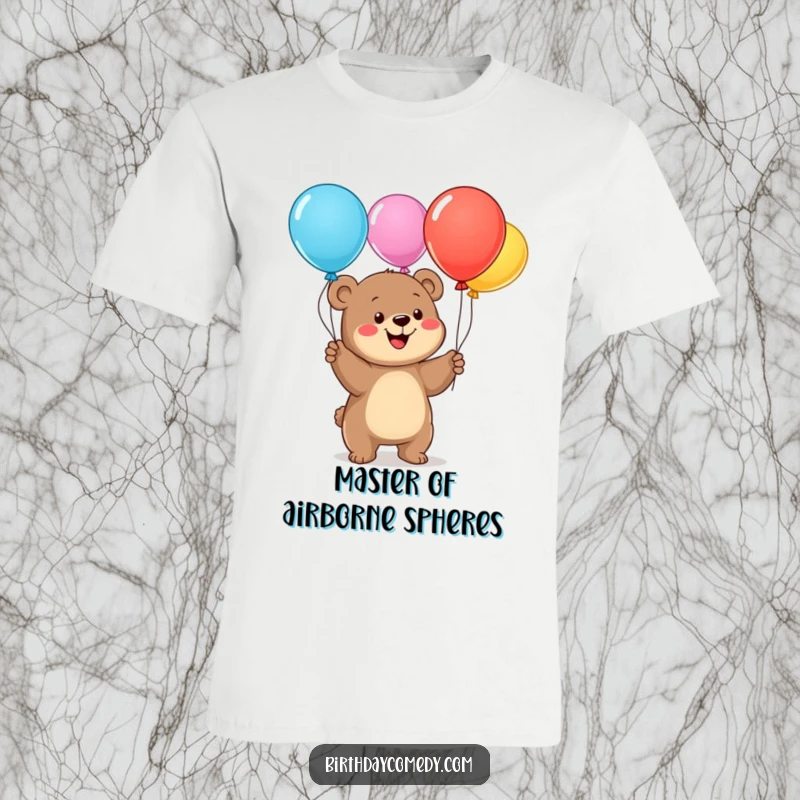 Funny bear cub t-shirt, a smiling character joyfully juggling colorful balloons, a whimsical and fun design for all ages.