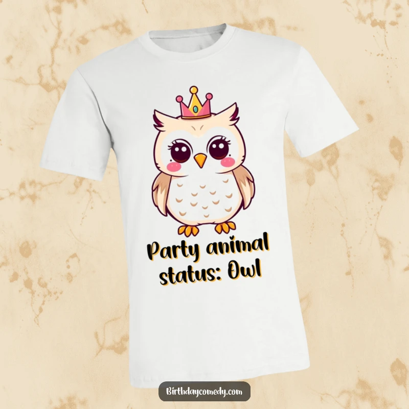 Funny joyful owl t-shirt wearing a small party crown, looking cheerful and ready to party, a humorous apparel choice.