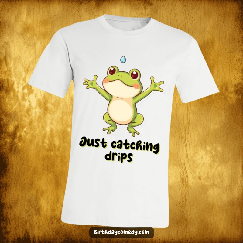 Funny frog t-shirt showing a playful frog with outstretched arms catching a falling dewdrop, a humorous and delightful design.