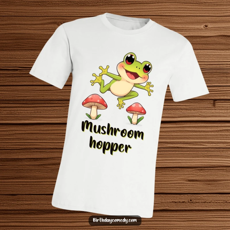 Funny t-shirt depicting a joyful frog with wide, curious eyes leaping dynamically from one mushroom cap to another, full of life.