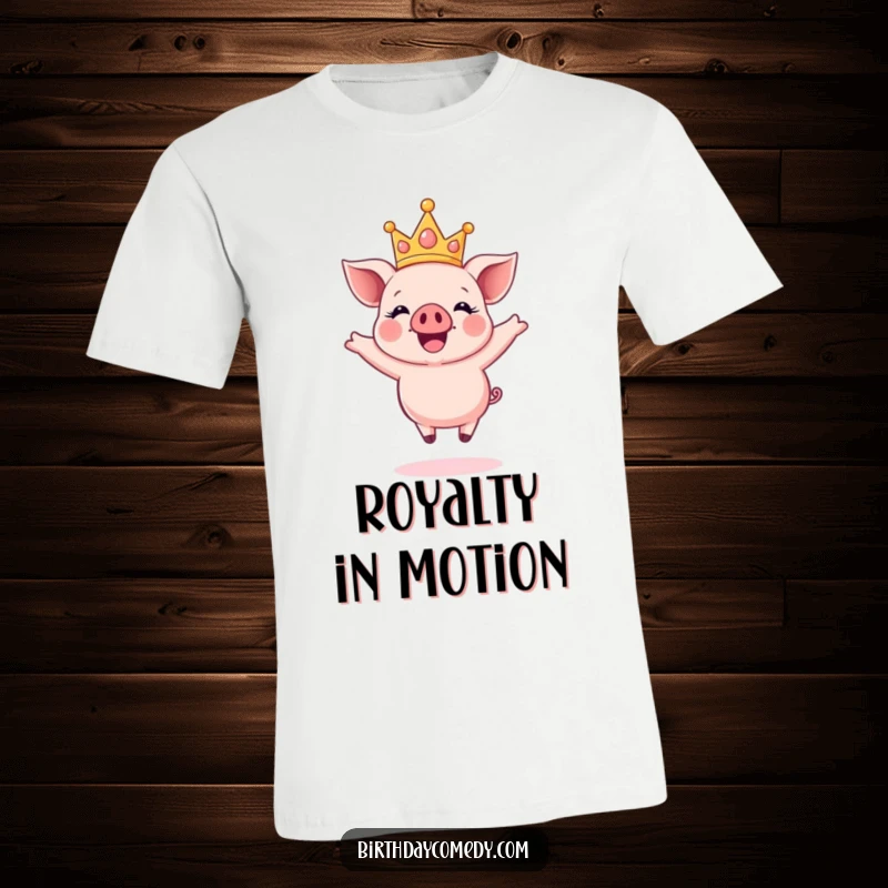 Funny t-shirt showing a happy piglet wearing a sparkling crown, joyfully leaping high in the air.