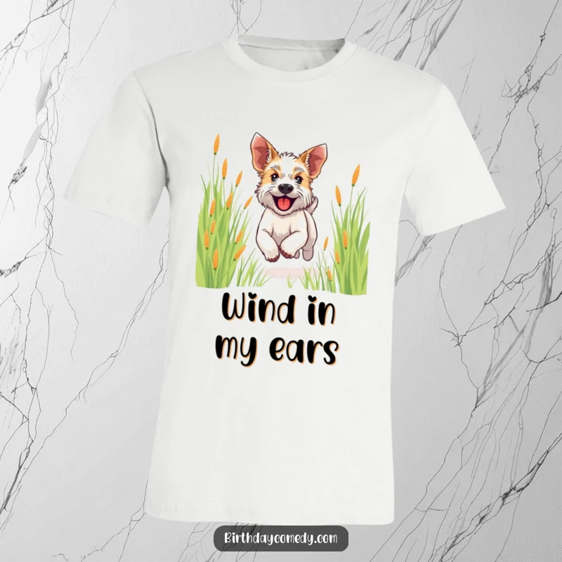 Funny terrier t-shirt showing a happy dog running through grass, ears flapping, radiating pure joy and freedom.