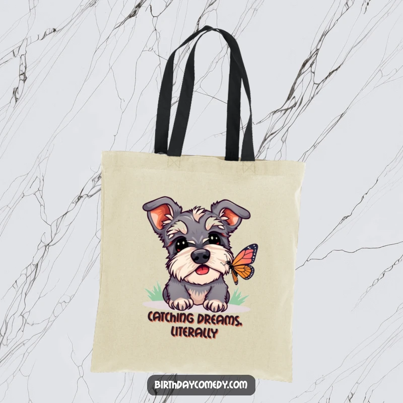 Funny schnauzer tote bag featuring a curious dog watching a butterfly, perfect for carrying items with a humorous touch.
