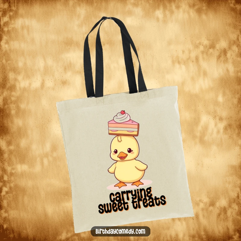 Funny Tote Bag featuring a tiny duckling holding a slice of cake balanced on its head, perfect for carrying goodies.